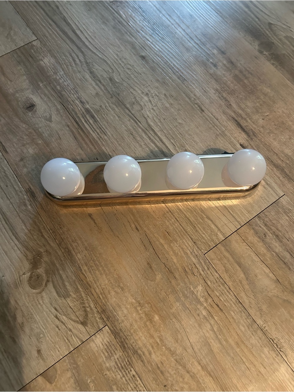 4-Bulb Vanity Light Bar in Silver with White Globe Bulbs